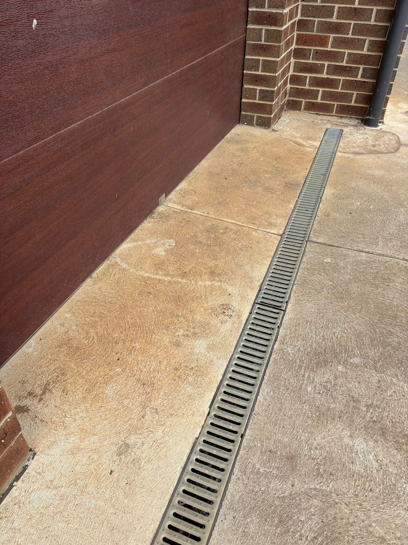 Driveway, concrete and path cleaning example by SS Exterior Services in Kilmore and Mitchell Shire